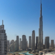Dubai Business Address Requirements Explained ‣ Sentinel Dubai Dubai skyline featuring the Burj Khalifa and Downtown Dubai under a clear blue sky.