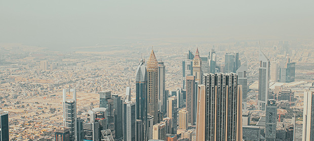 How Much Does It Cost to Set Up a Company in Dubai_ ‣ Sentinel Dubai Aerial view of Dubai’s Sheikh Zayed Road skyline, representing the cost of setting up a company in Dubai.