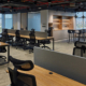 Sentinel’s modern serviced office in Dubai, featuring shared workspaces, ergonomic seating and panoramic city views.